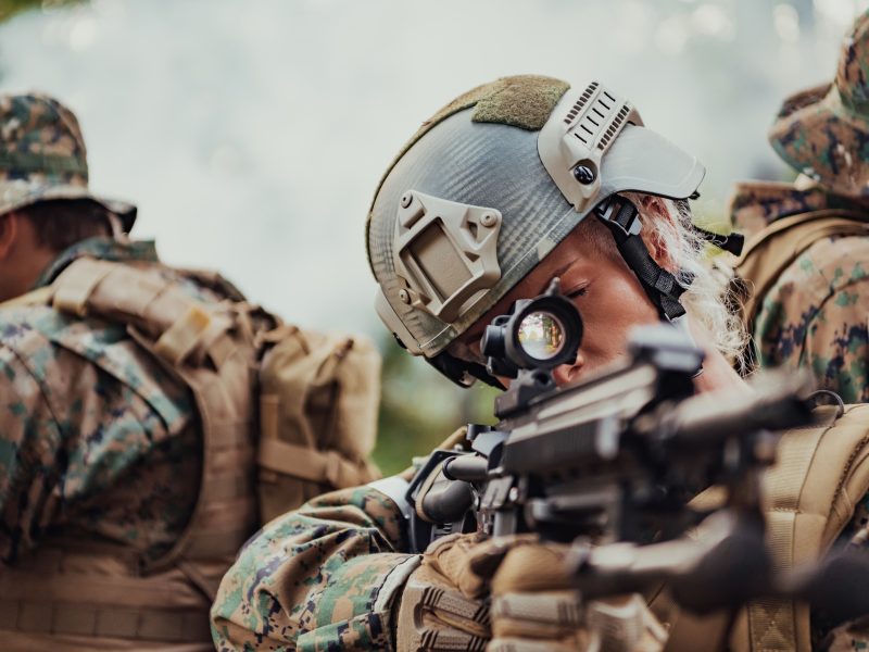 Modern Warfare Soldiers Squad Running in Tactical Battle Formation Woman as a Team Leader